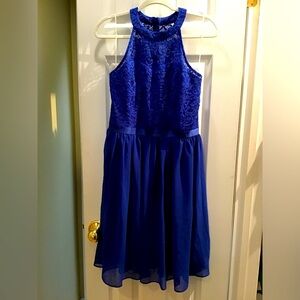 Royal blue knee length dress with zipper.